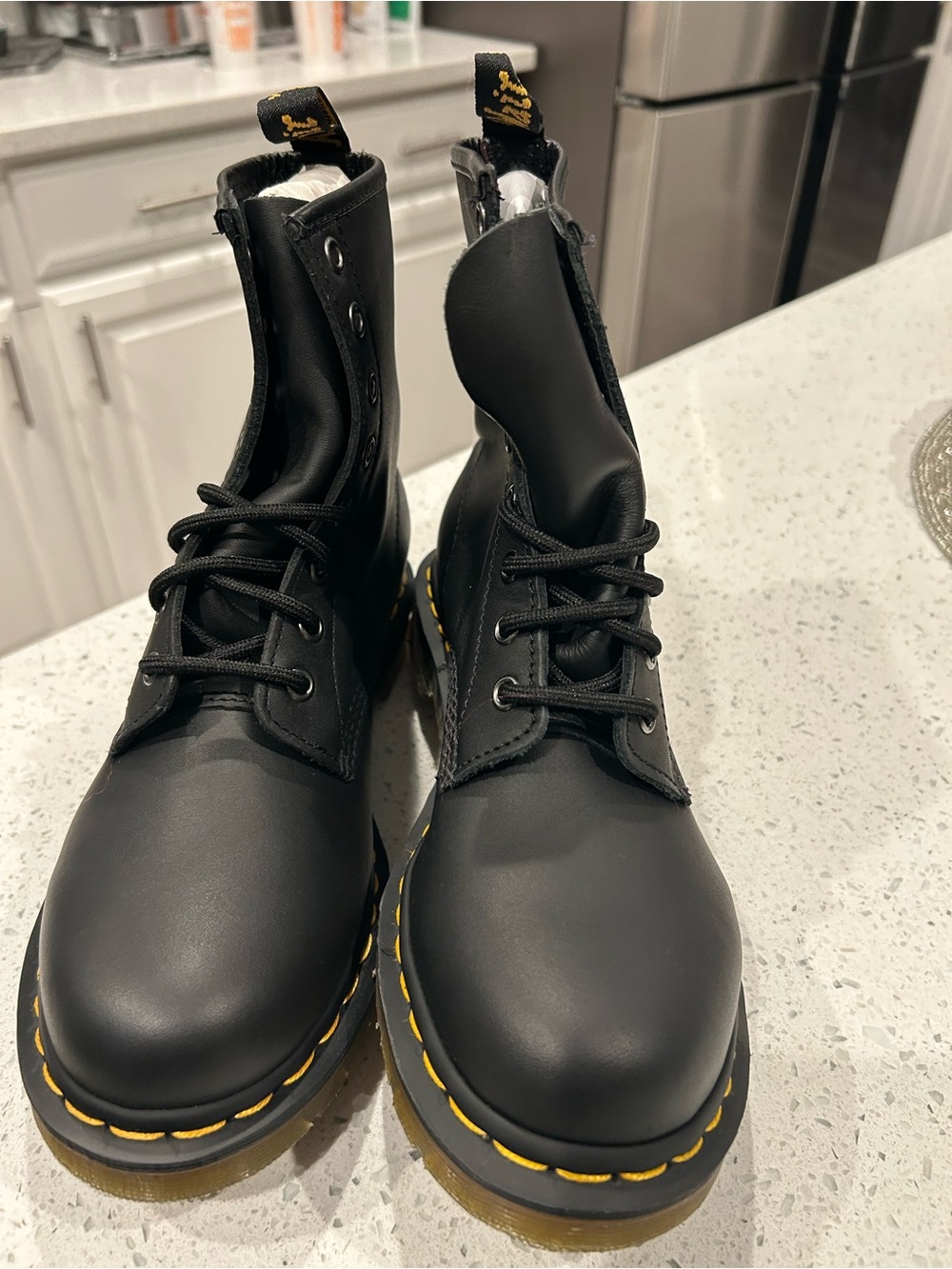 Dr. Martens Black Leather 8-Eye Lace-Up Boots with Yellow Stitching